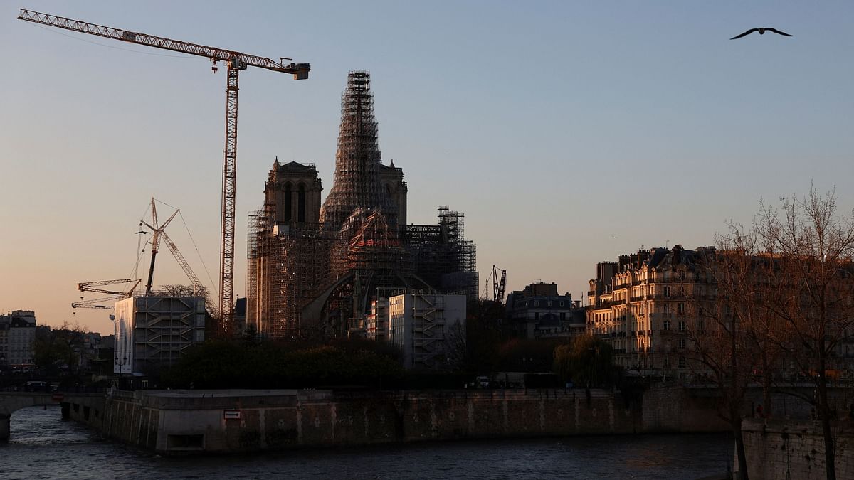 A view of high scaffolding and the framework of the new spire of the Notre-Dame cathedral, which was damaged in a devastating fire four years ago, as restoration works continue, in Paris. 