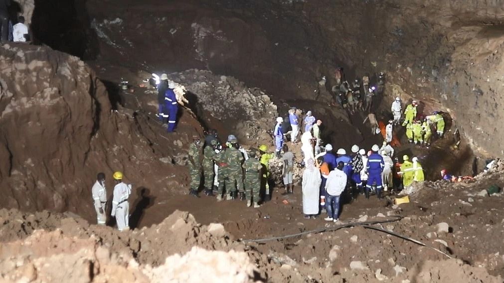 Rescuers pull out first survivor of Zambia landslide that trapped 25 miners