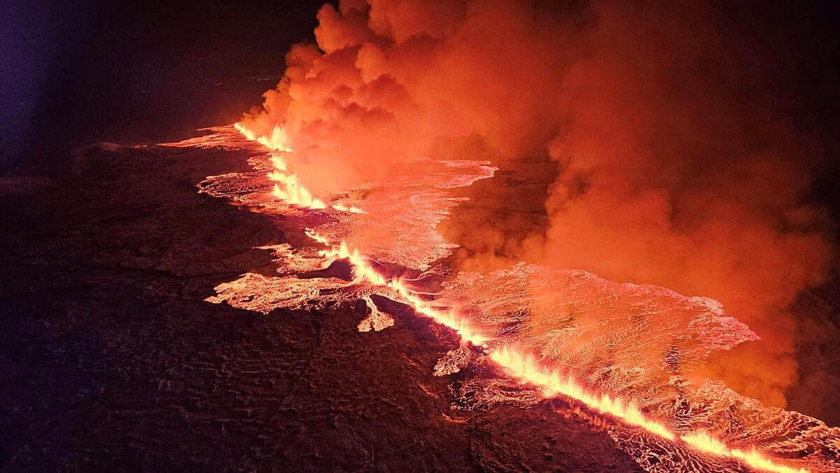 A volcano spews lava and smoke as it erupts in Grindavik, Iceland.