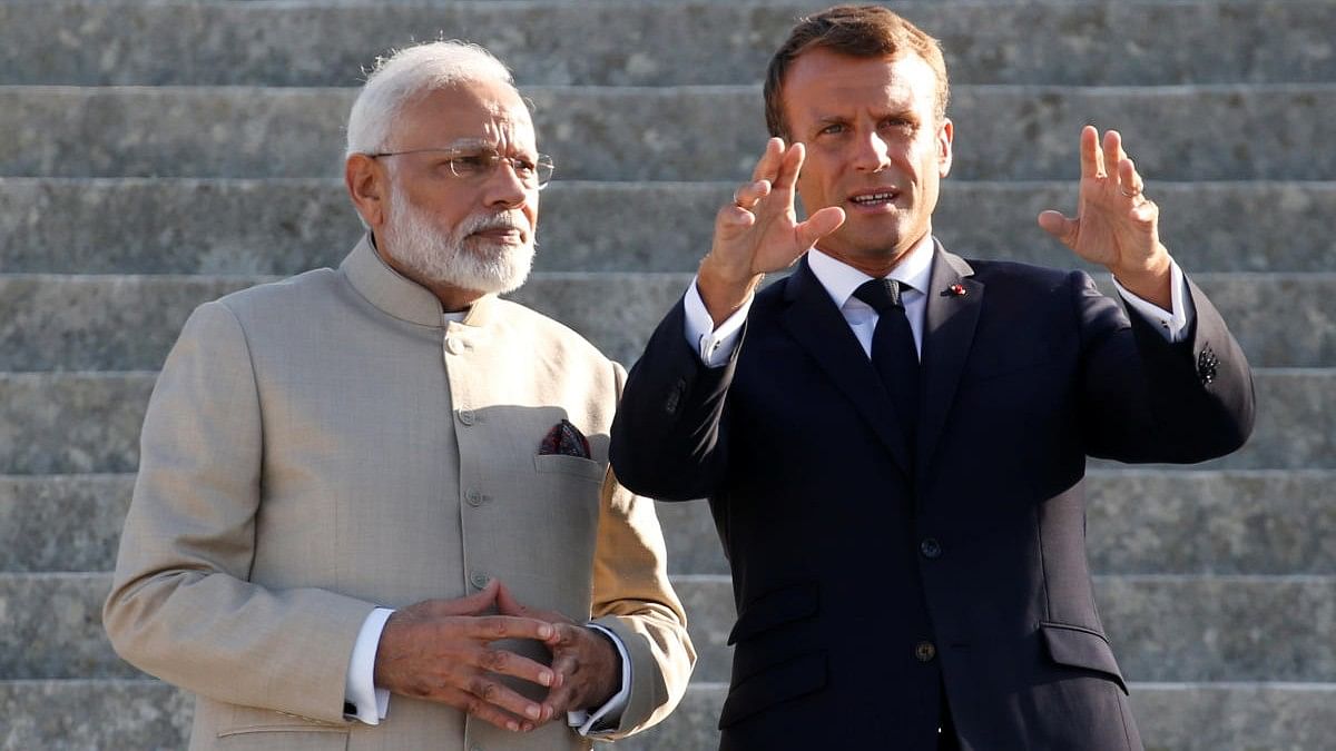 Narendra Modi and Emmanuel Macron.