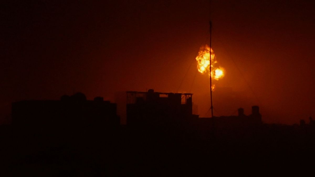 An explosion takes place during Israeli air strikes over Gaza, amid the ongoing conflict between Israel and the Palestinian Islamist group Hamas, in Khan Younis in the southern Gaza Strip. 