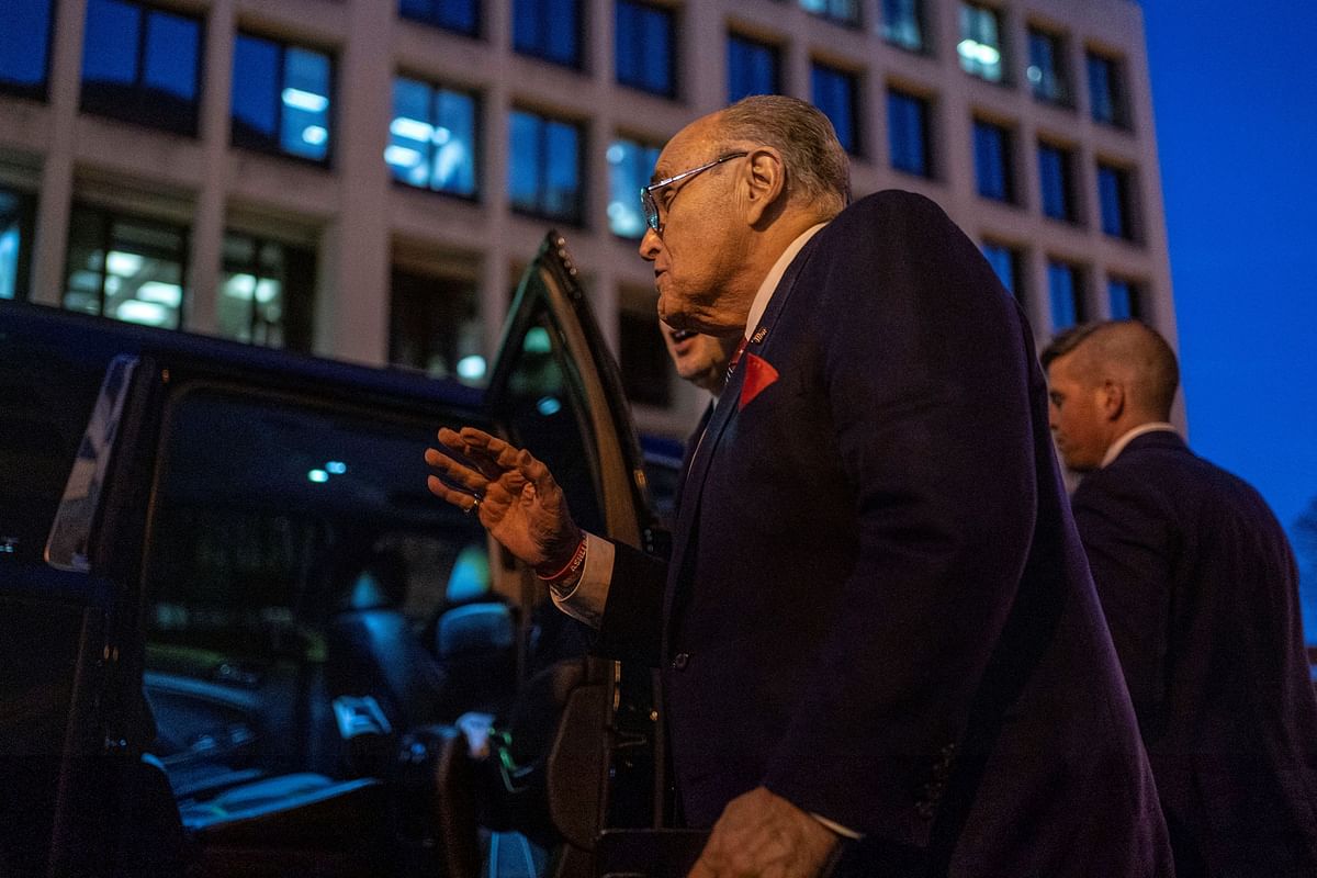 Former New York Mayor Rudy Giuliani departs U.S. District Court, where the trial for his defamation lawsuit is held, in Washington.