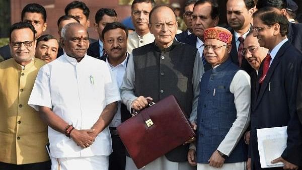 Former Finance Minister Arun Jaitley holding the Union Budget briefcase at Parliament. (Union Budget 2018-19)