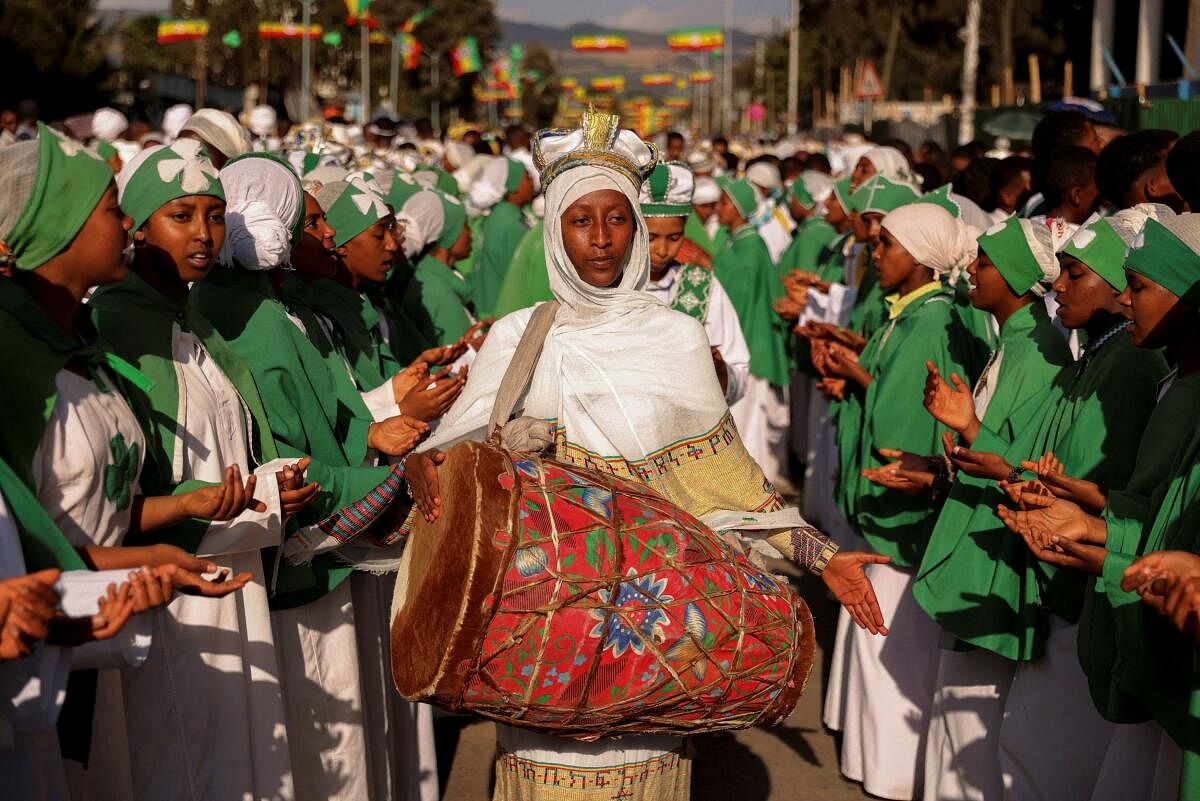 Ethiopian Orthodox Church choir members sing during the annual Epiphany celebration called "Timket" to commemorate Jesus Christ's baptism in the Jordan River by John the Baptist, in Addis Ababa, Ethiopia, January 19, 2024