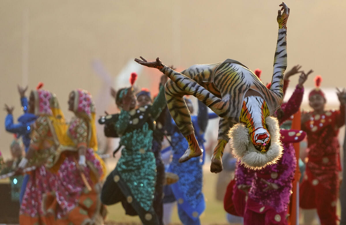 An NCC cadet performs during Prime Minister's NCC rally, at Cariappa Ground in New Delhi, Saturday.