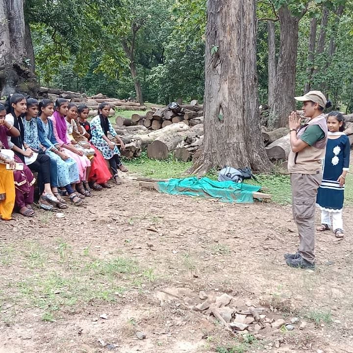 Rajani interacts with a group of visitors in Dandeli.