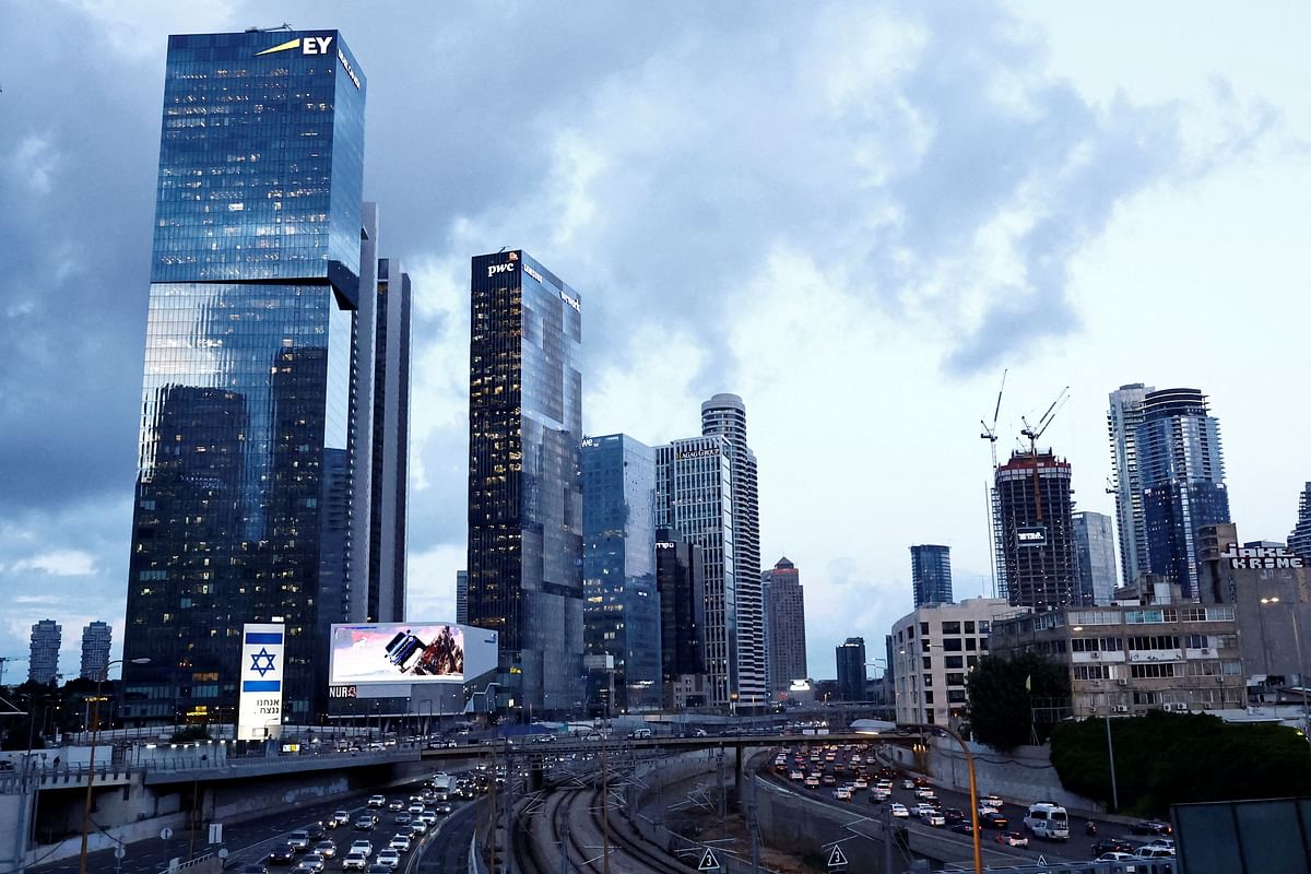 A giant Israeli flag is seen on a billboard with a message in Hebrew saying 'we will win’, amid the ongoing conflict between Israel and the Palestinian Islamist group Hamas, in Tel Aviv, Israel January 3, 2024. 