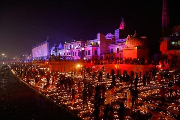 Hindu devotees light earthen oil lamps on the bank of the Sarayu river to celebrate the inauguration of the Lord Ram temple, in Ayodhya, India, January 22, 2024. 