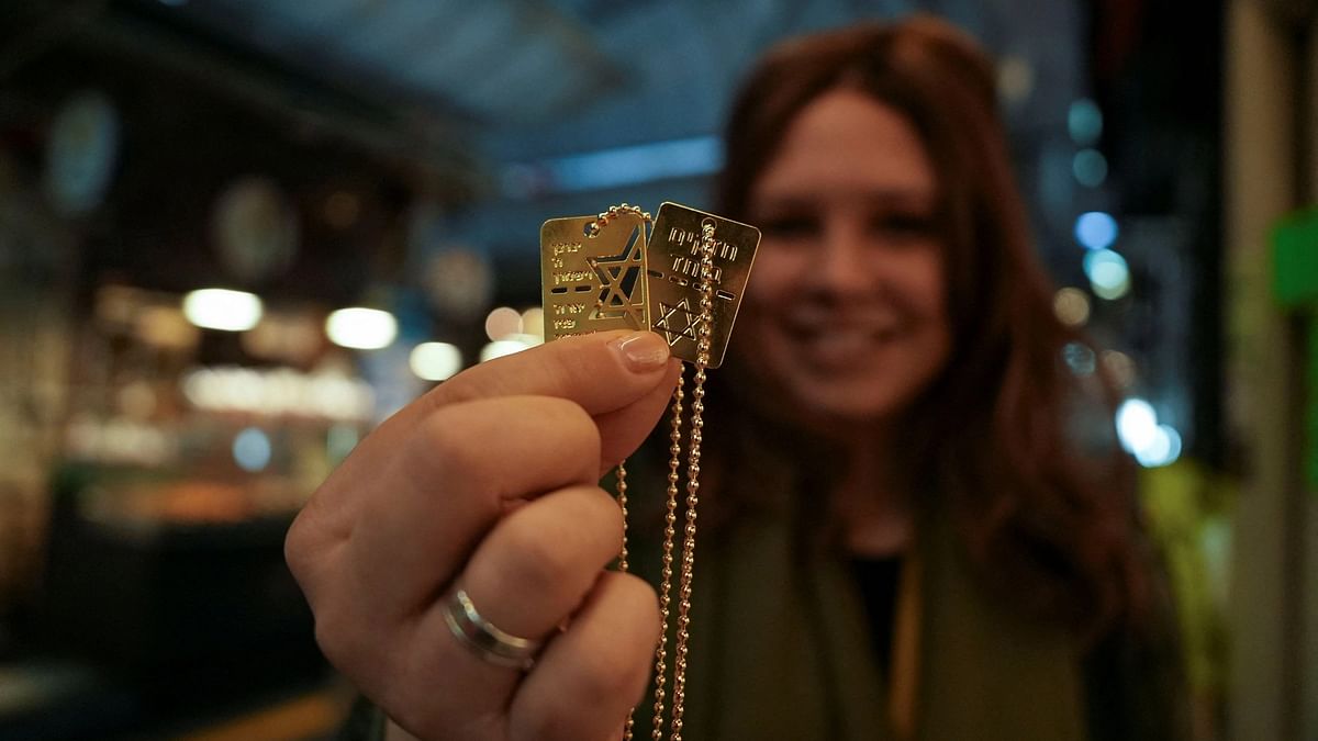 Israelis wear dog tags in solidarity with hostages and each other