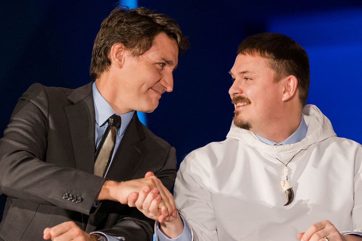 Canada’s Prime Minister Justin Trudeau takes part in a devolution ceremony in Iqaluit.