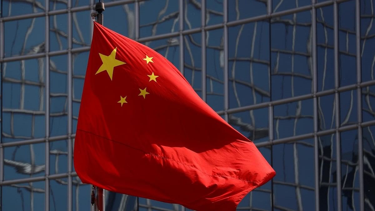 China acknowledges imprisoning a British man on spy charges