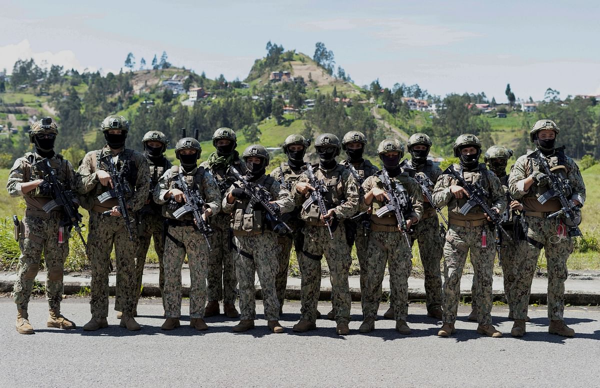 Ecuadorean soldiers pose for a picture as they take part in an operation to take control of the Turi prison, in Cuenca, Ecuador