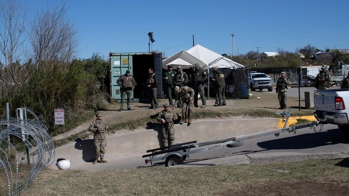 Three migrants drown at US border as Texas, White House feud