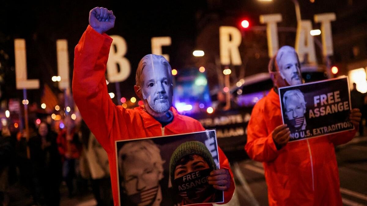 WikiLeaks founder Julian Assange's supporters demonstrate against US extradition in Barcelona.