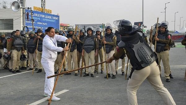 Day ahead of farmers' march, police beef up security at Delhi borders