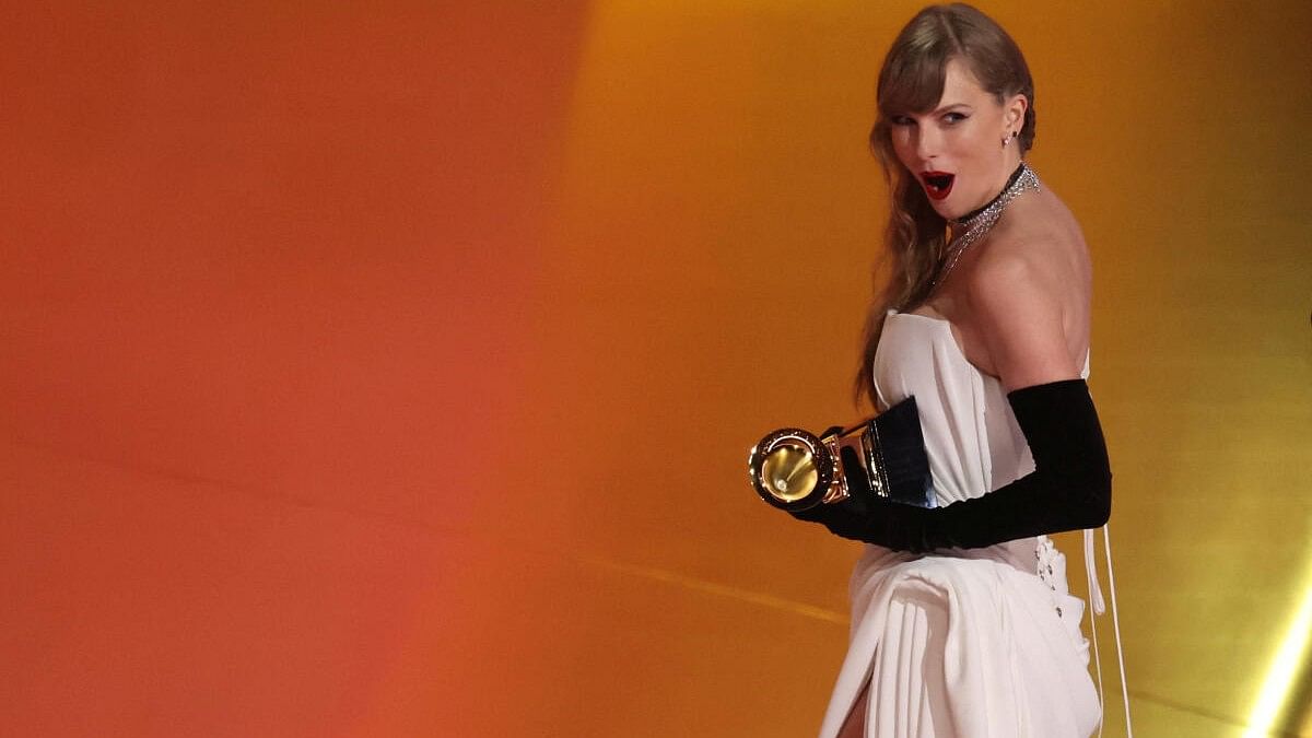 Taylor Swift announces 11th album 'The Tortured Poet's Department' at Grammys 2024, releases poster cover