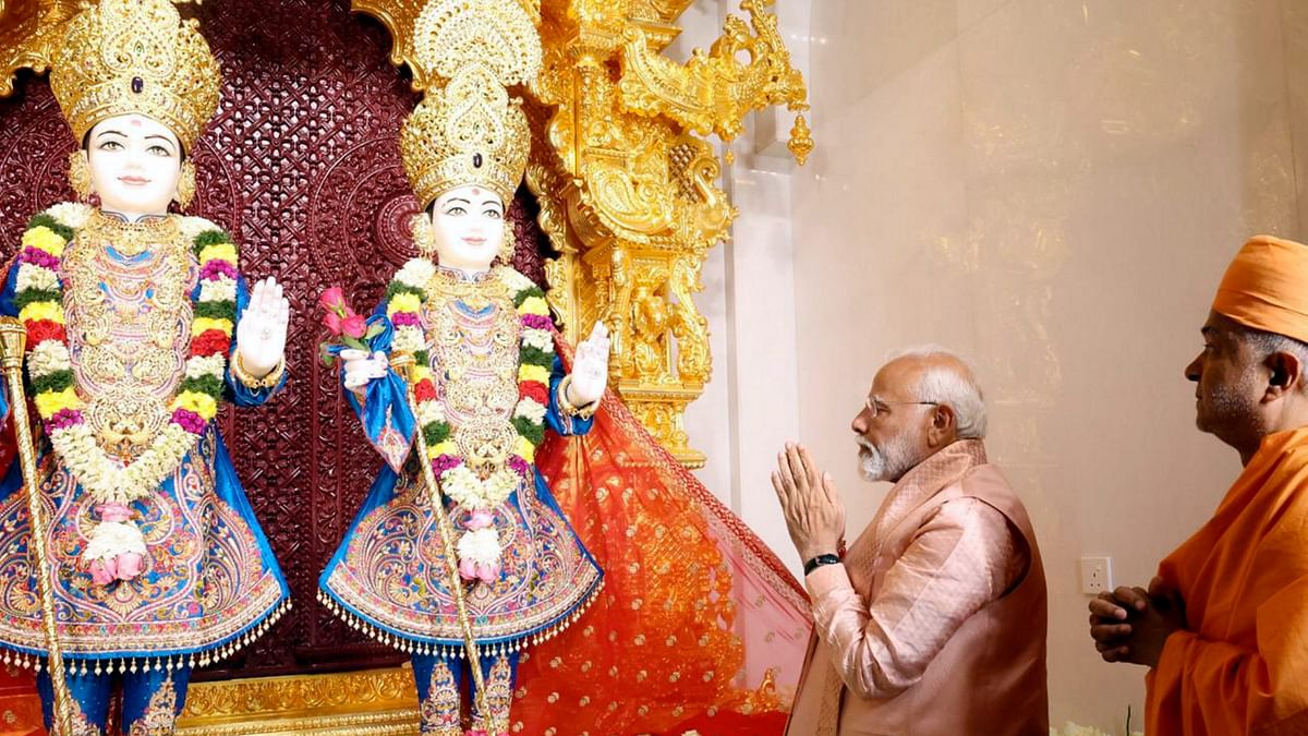 Prime Minister Narendra Modi offers prayers at the newly inaugurated BAPS Hindu Mandir in Abu Dhabi, UAE.