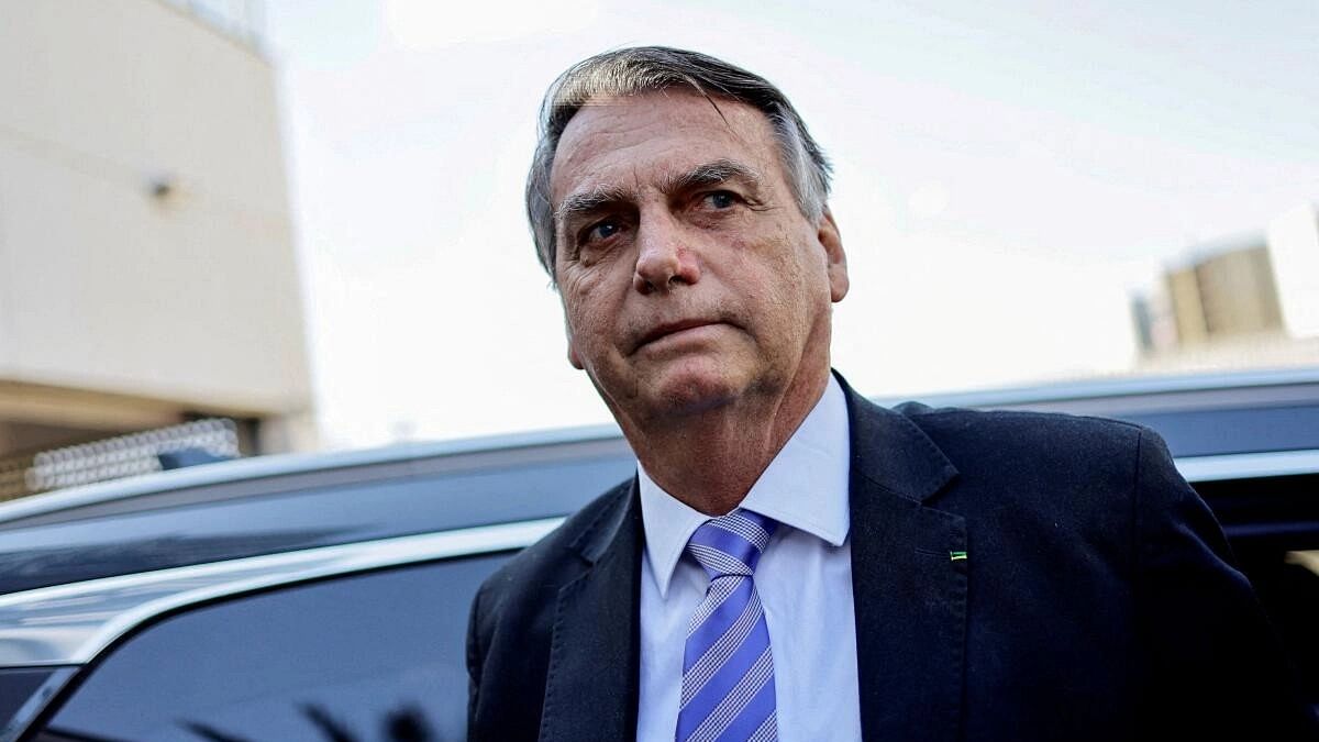 Brazil police seize Bolsonaro's passport as net tightens in coup probe