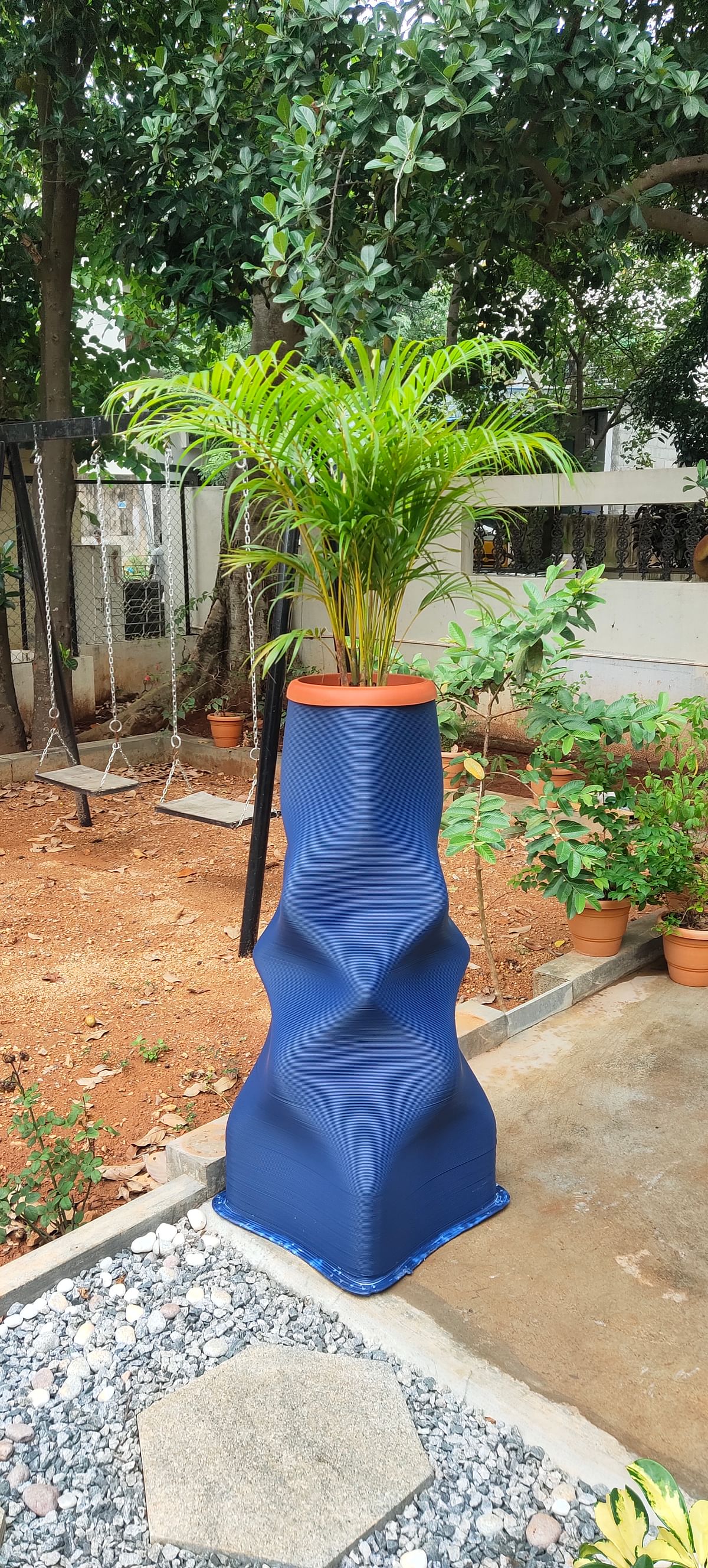 A 3D-printed planter using upcycled plastic. 
