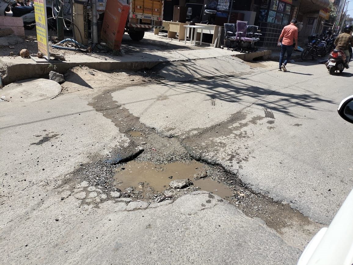 A pothole in Nagawara junction towards Veeranapalya. 