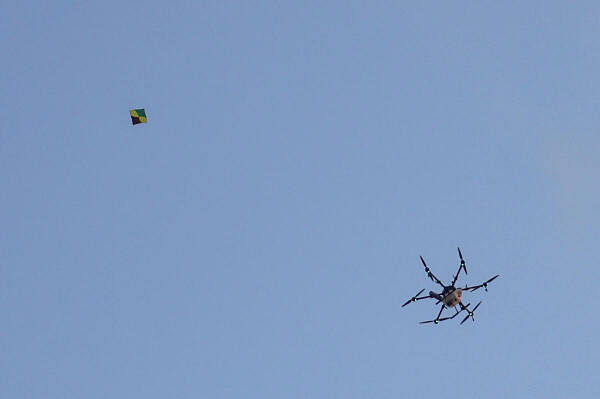 Farmers fly kites to counter drone attacks.