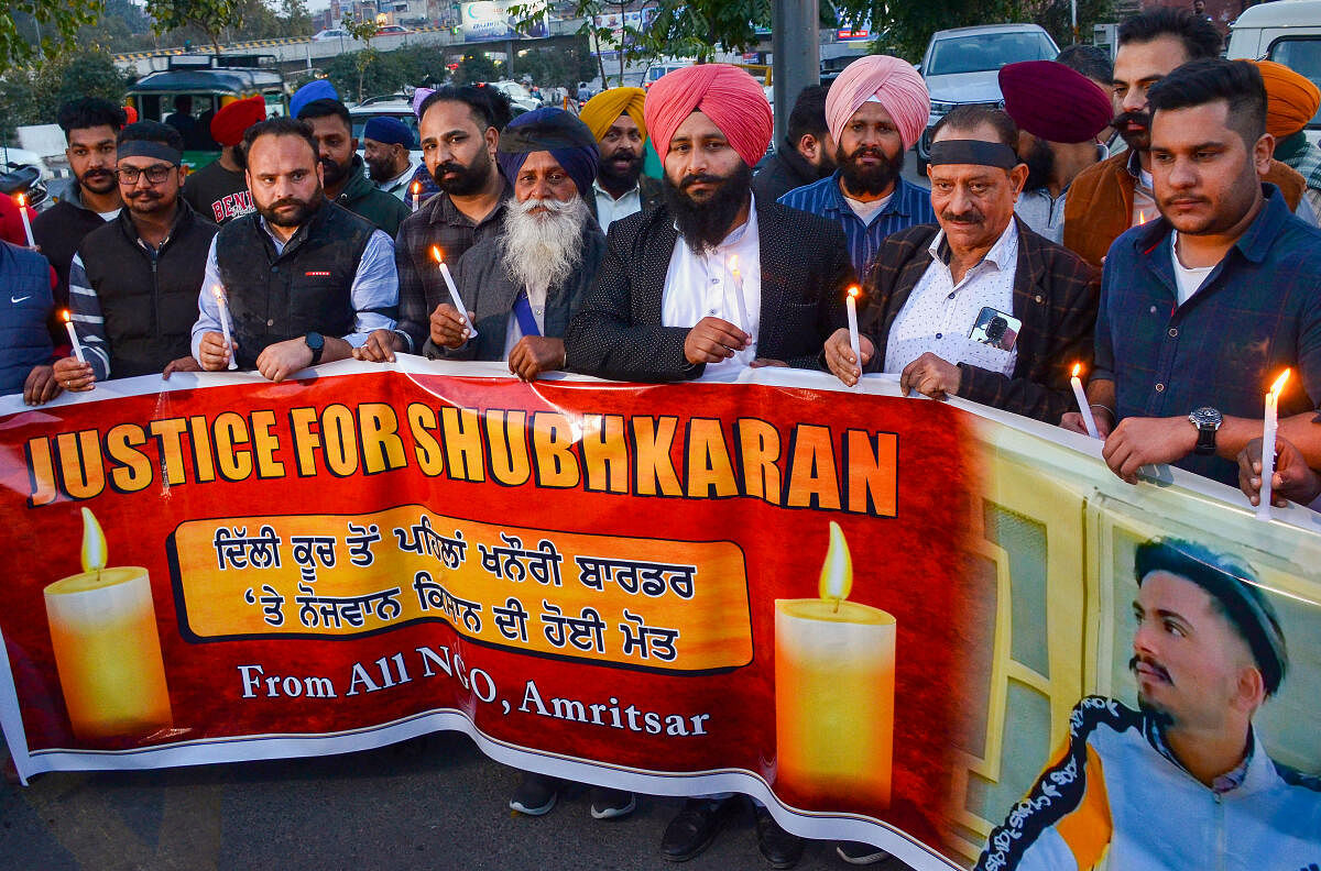 Members of various NGOs took part in a candlelight vigil at the Punjab-Haryana Shambhu border, in Amritsar.