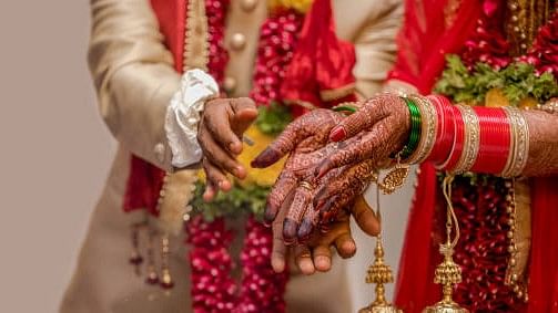 After groom skips wedding, woman marries kin to get benefits of CM's Mass Marriage scheme