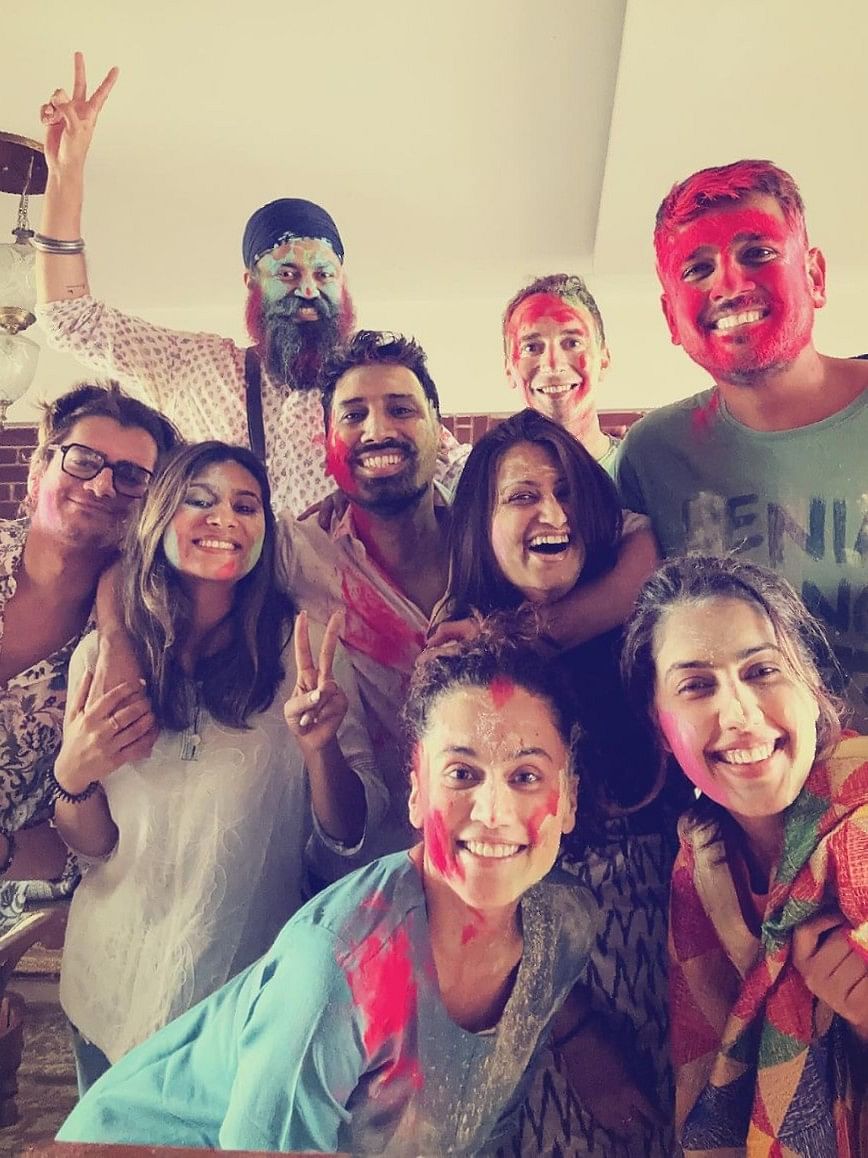 Drenched in colours, Taapsee Pannu and Mathias Boe pose with their friends.