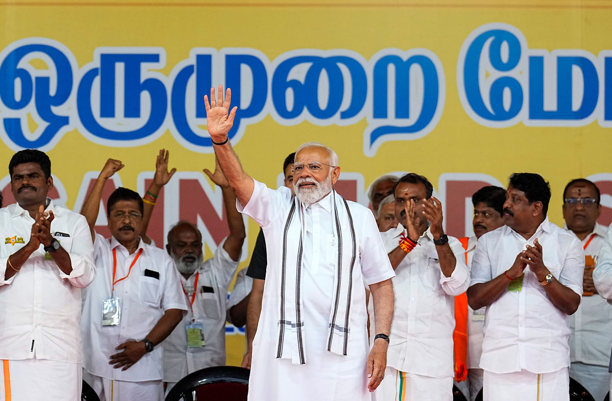 Prime Minister Narendra Modi waves at supporters during a public meeting ahead of the Lok Sabha elections, at Nandanam YMCA Ground in Chennai, on Monday.