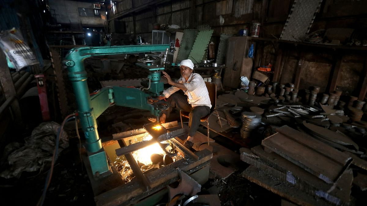 Jan industrial output growth slips to 3.8%; Feb inflation stays flat