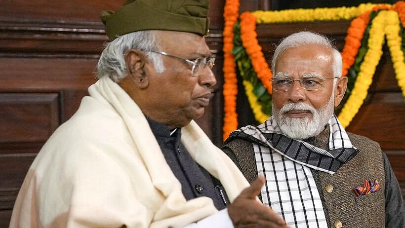 Indian National Congress Party Chairman Mallikarjun Kharge (left) and Prime Minister Narendra Modi.