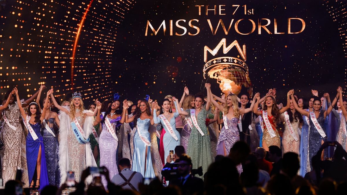 Miss World 2024 Krystyna Pyszkova (2L) with fellow participants at the 71st Miss World finale in Mumbai.