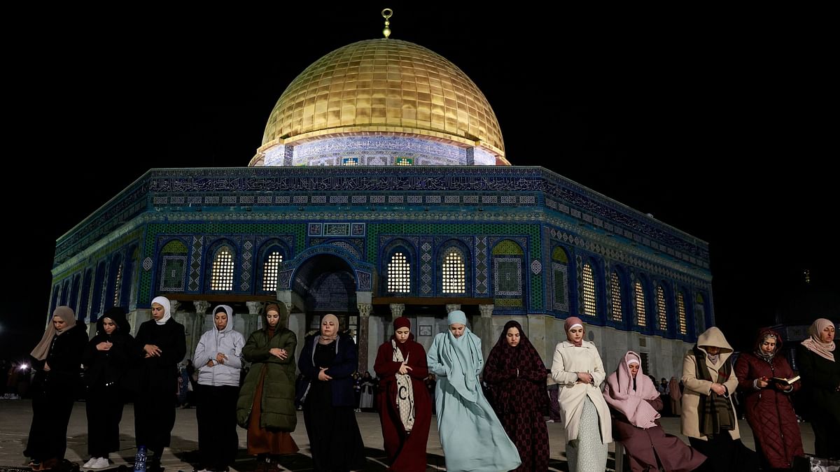 Muslims take part in the evening Tarawih prayers during the beginning of Ramadan at the Al-Aqsa compound in Jerusalem.