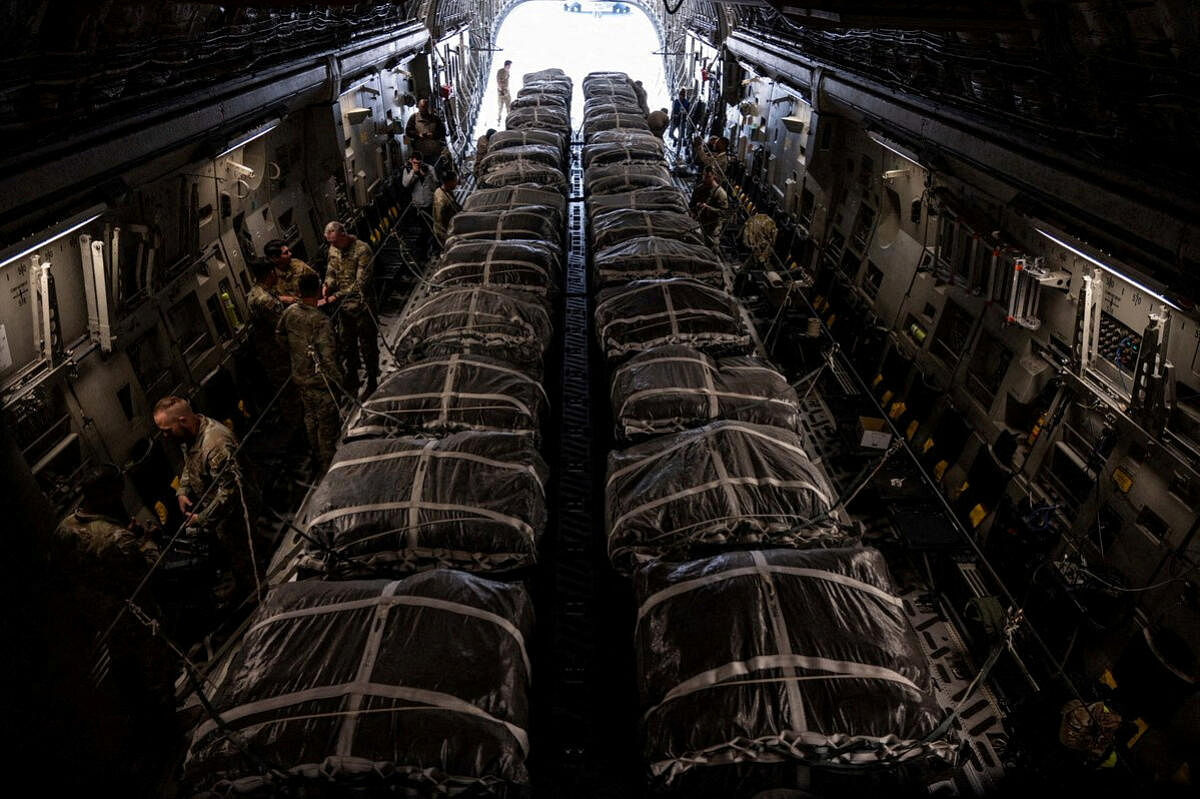 A US airforce aircraft is loaded with Humanitarian Airdrops for Gaza.
