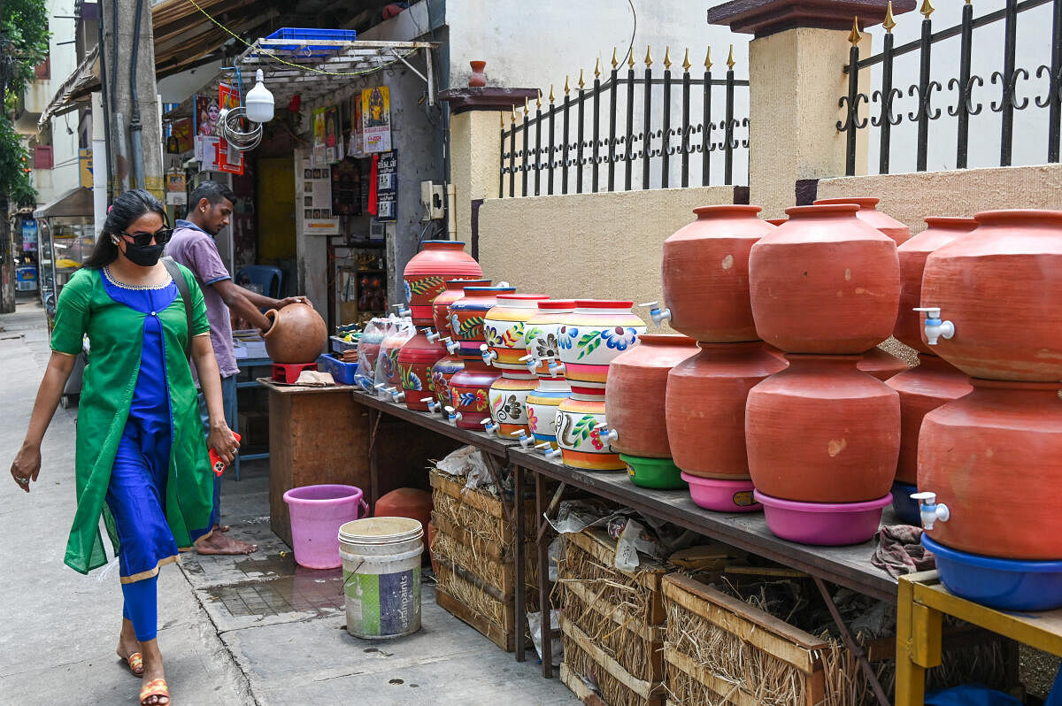 Clay pots on sale amid rising temperature and water crisis in Malleshwara in Bengaluru.