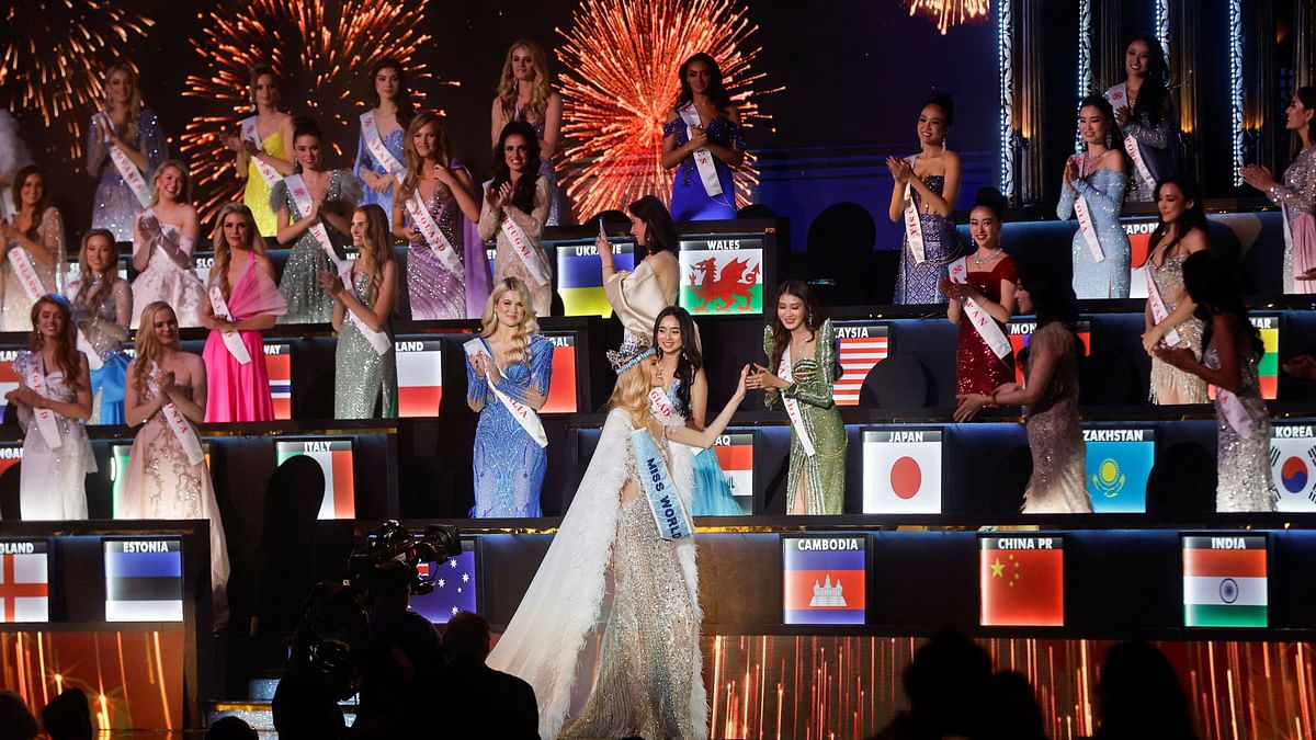 Krystyna Pyszkova celebrates with the fellow participants after being crowned Miss World at the 71st Miss World finale in Mumbai.