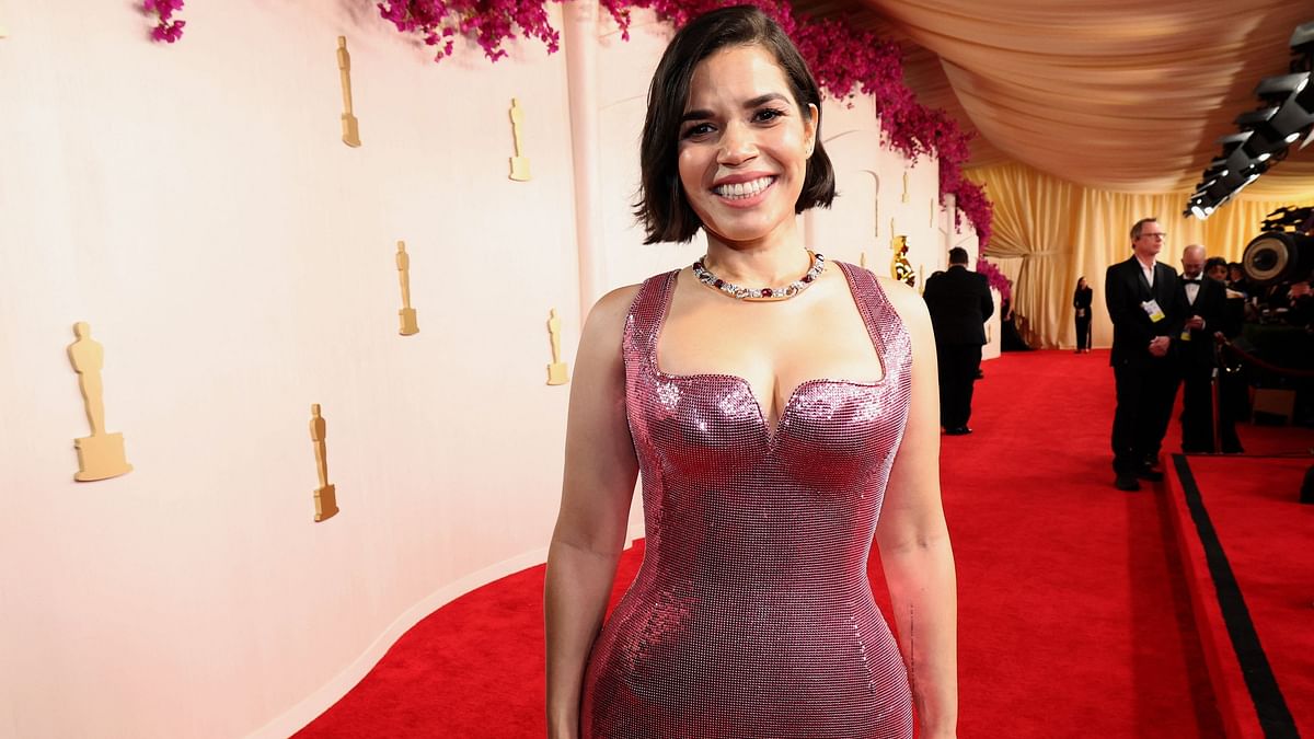 Barbie best-supporting actress nominee America Ferrera arrived in a sparkly pink form-fitting gown.