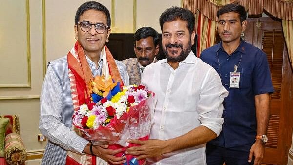 Telangana CM Revanth Reddy pays courtesy visit to CJI in Hyderabad
