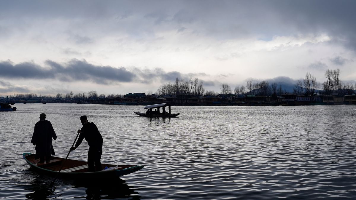Fishing community in polluted waters of Kashmir's Dal Lake struggle for survival