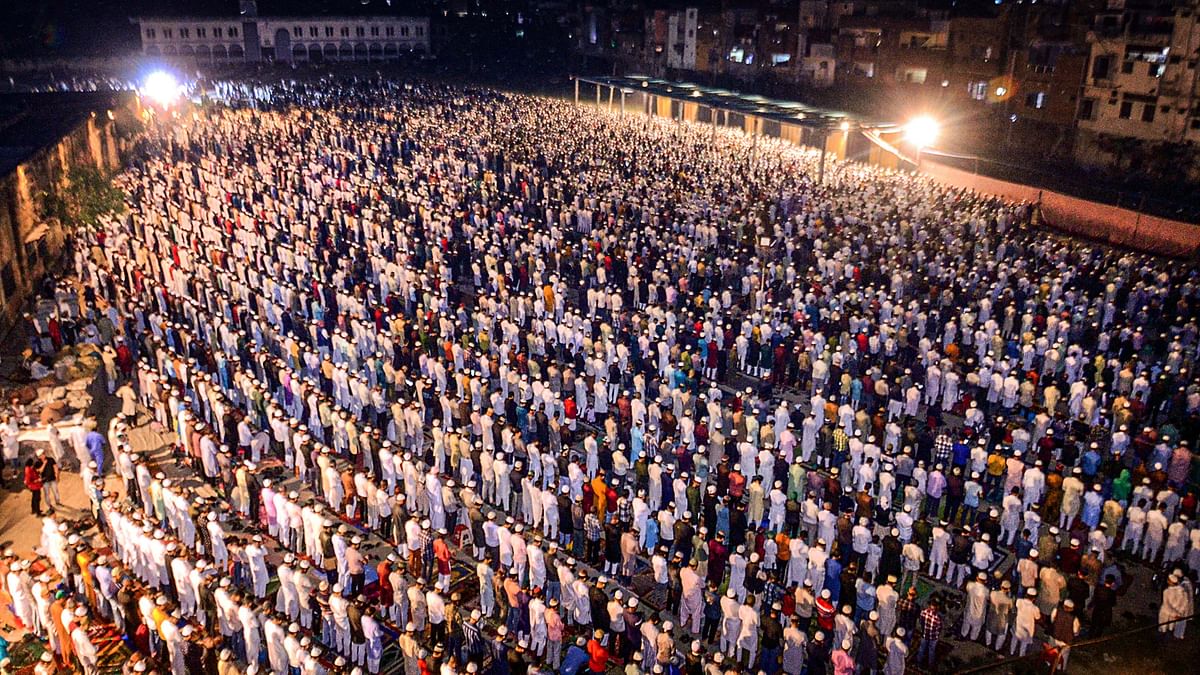 Muslims attend Tarawih prayers after the crescent moon was sighted in India, marking the beginning of the holy month of Ramadan, in Kanpur.
