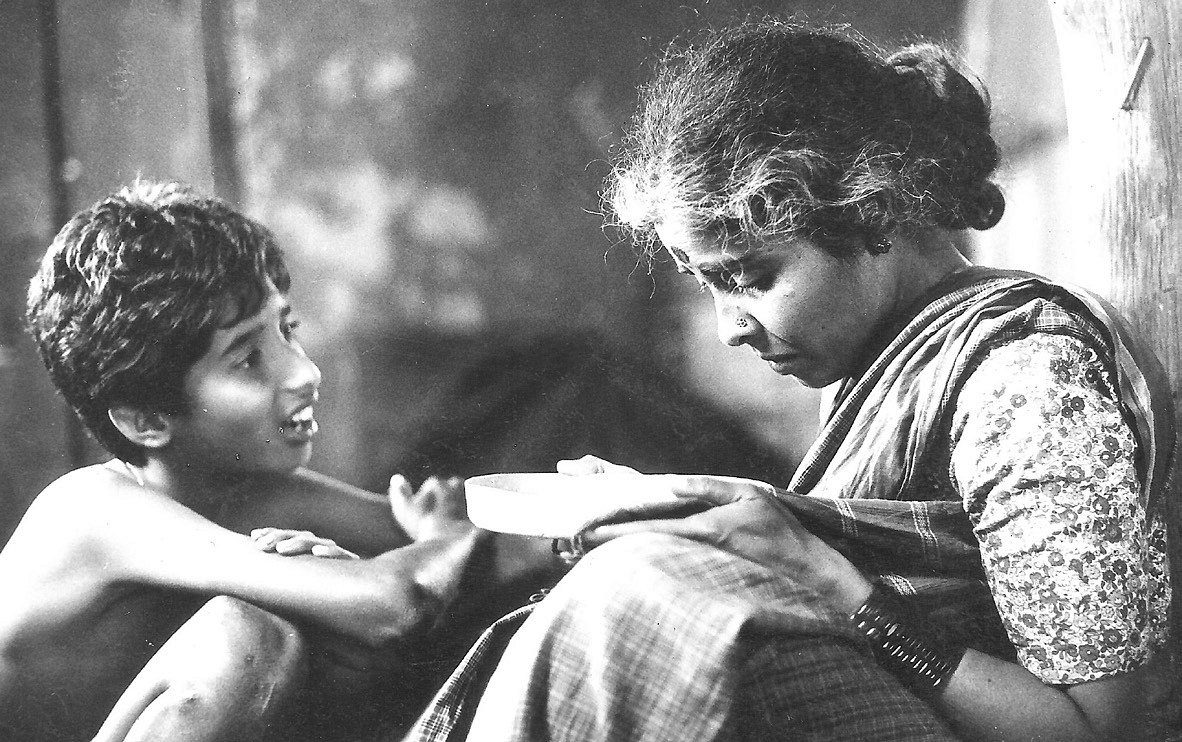 Appi and her adopted son Babu in 'Tabarana Kathe' (1986).