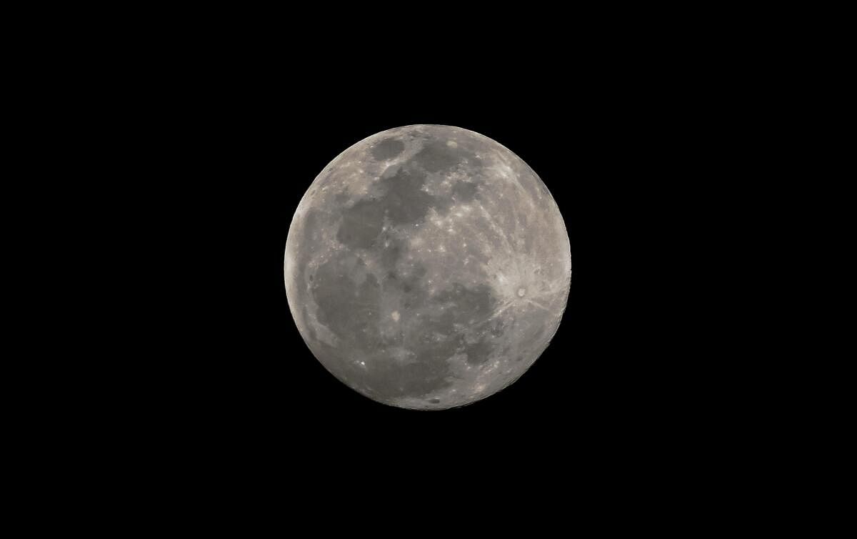 View of the full moon on 'Dol Purnima', in Nadia on Sunday.