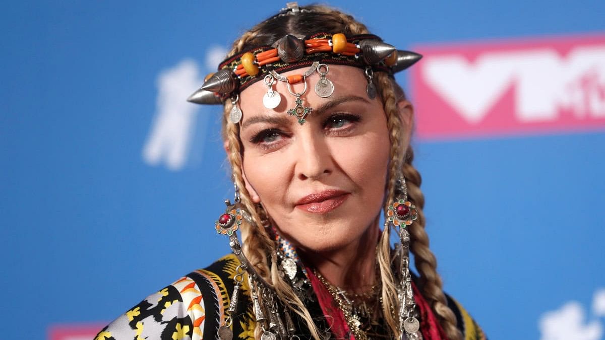 Madonna calls out fan for sitting during concert, later sees they're wheelchair-bound: Report