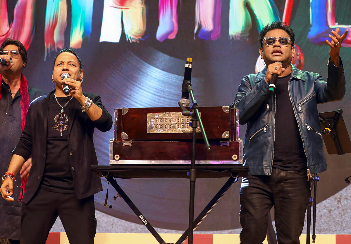 Playback singer Kailash Kher (L) and composer &amp; singer A R Rahman (R) perform during the trailer launch of upcoming Indian Hindi-language biographical drama Netflix film ‘Amar Singh Chamkila’, in Mumbai.