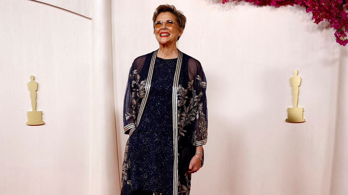 Nyad best actress nominee Annette Bening arrived wearing midnight blue outfit.