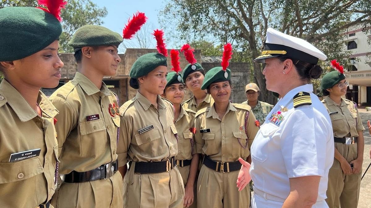 American marines, sailors interact with woman NCC cadets in Visakhapatnam