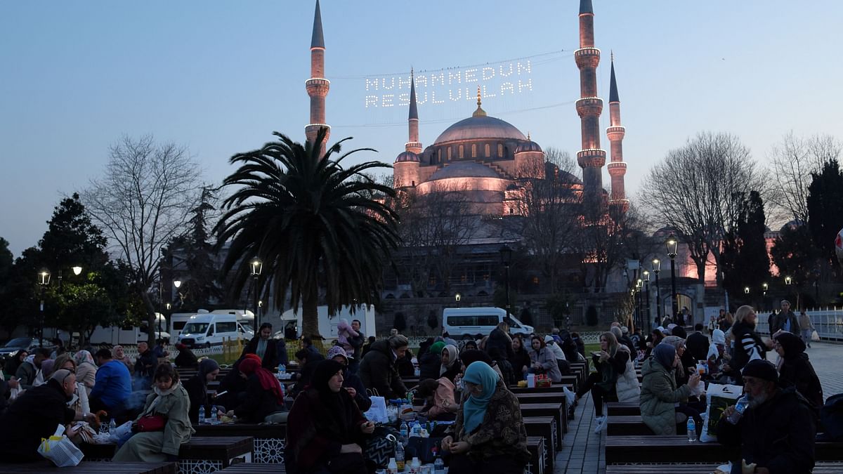 People break their fast during the holy month of Ramadan at Sultanahmet Square in Istanbul, Turkey.