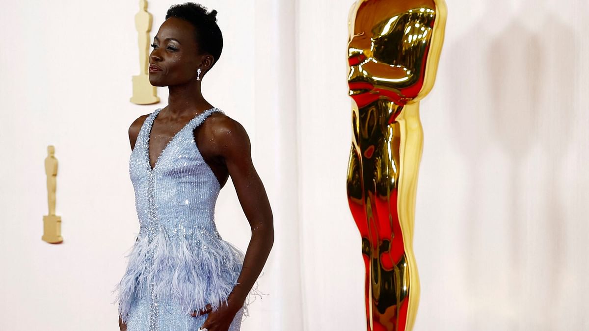 Lupita Nyong’o graced the Oscar 2024 red carpet in Armani Prive blue gown.