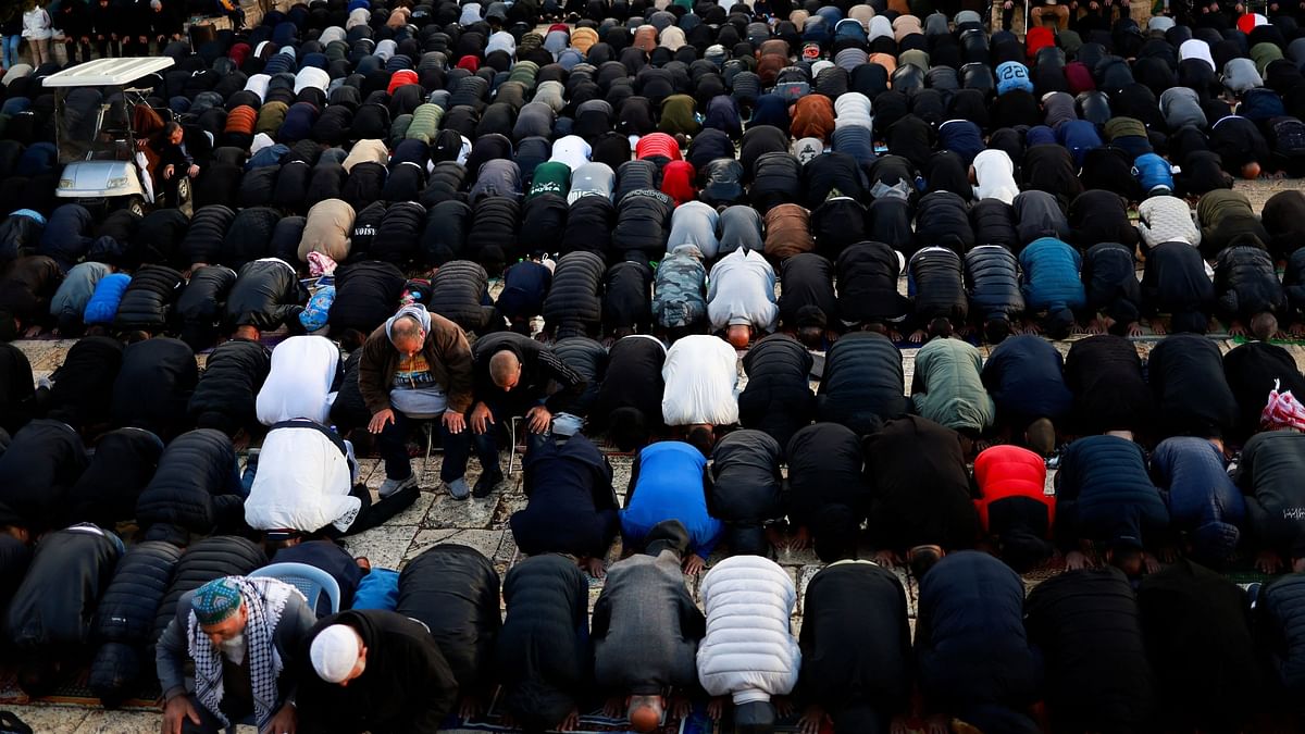 Muslims attend Eid al-Fitr prayers which mark the end of Ramadan in the Al-Aqsa compound, amid the ongoing conflict in Gaza between Israel and Hamas.