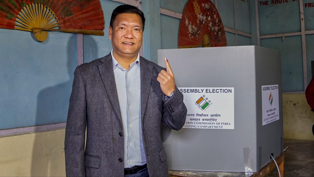 Arunachal Pradesh Chief Minister Pema Khandu shows his finger marked with indelible ink after casting his vote for the first phase of Lok Sabha elections, in Tawang.
